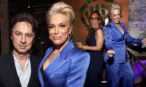 Hannah Waddingham puts on a busty display in plunging blue。